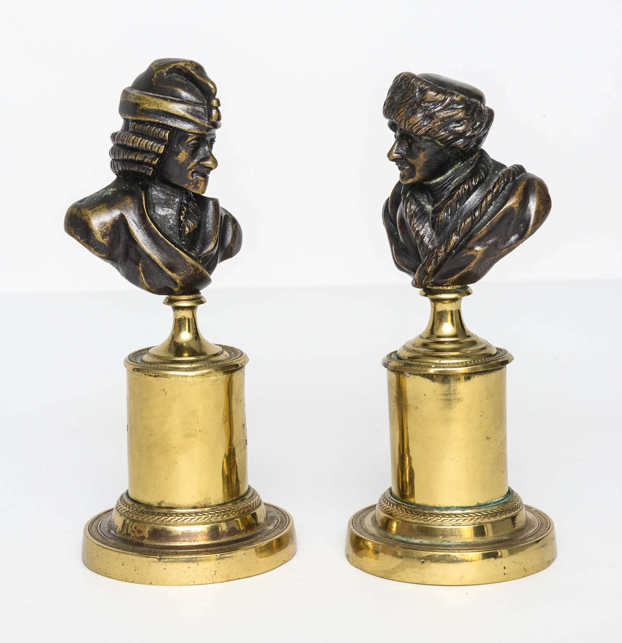 These busts of Jean Jacques Rousseau and François-Marie Arouet, known by his nom de plume Voltaire, were writers and philosophers of the French Enlightenment.