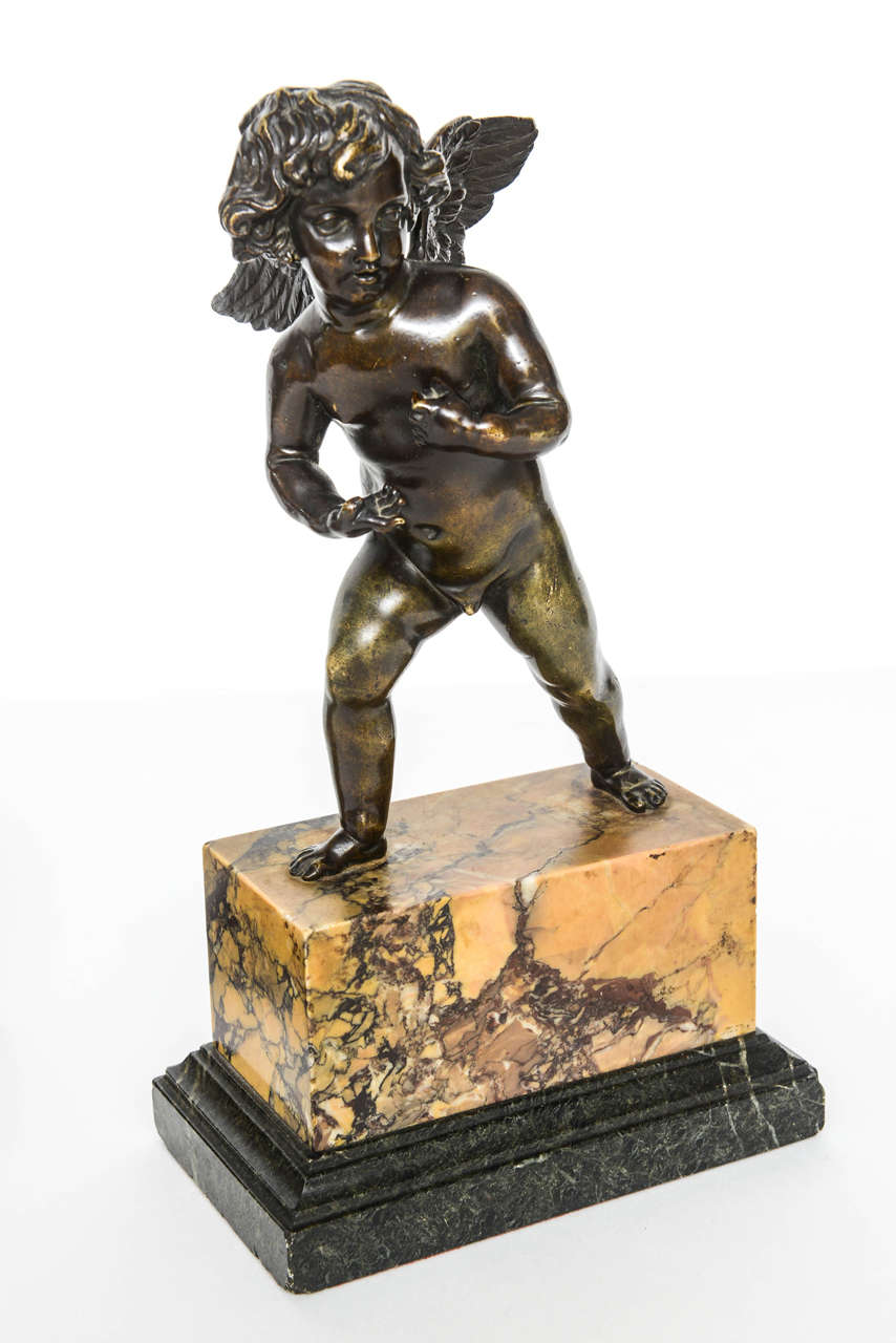 Neoclassical Pair of French Bronze Striding Cupids, circa 1800