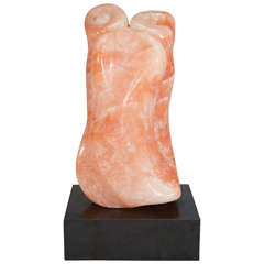 A Coral Colored Stone Sculpture with Revolving Base, Signed ESR 11