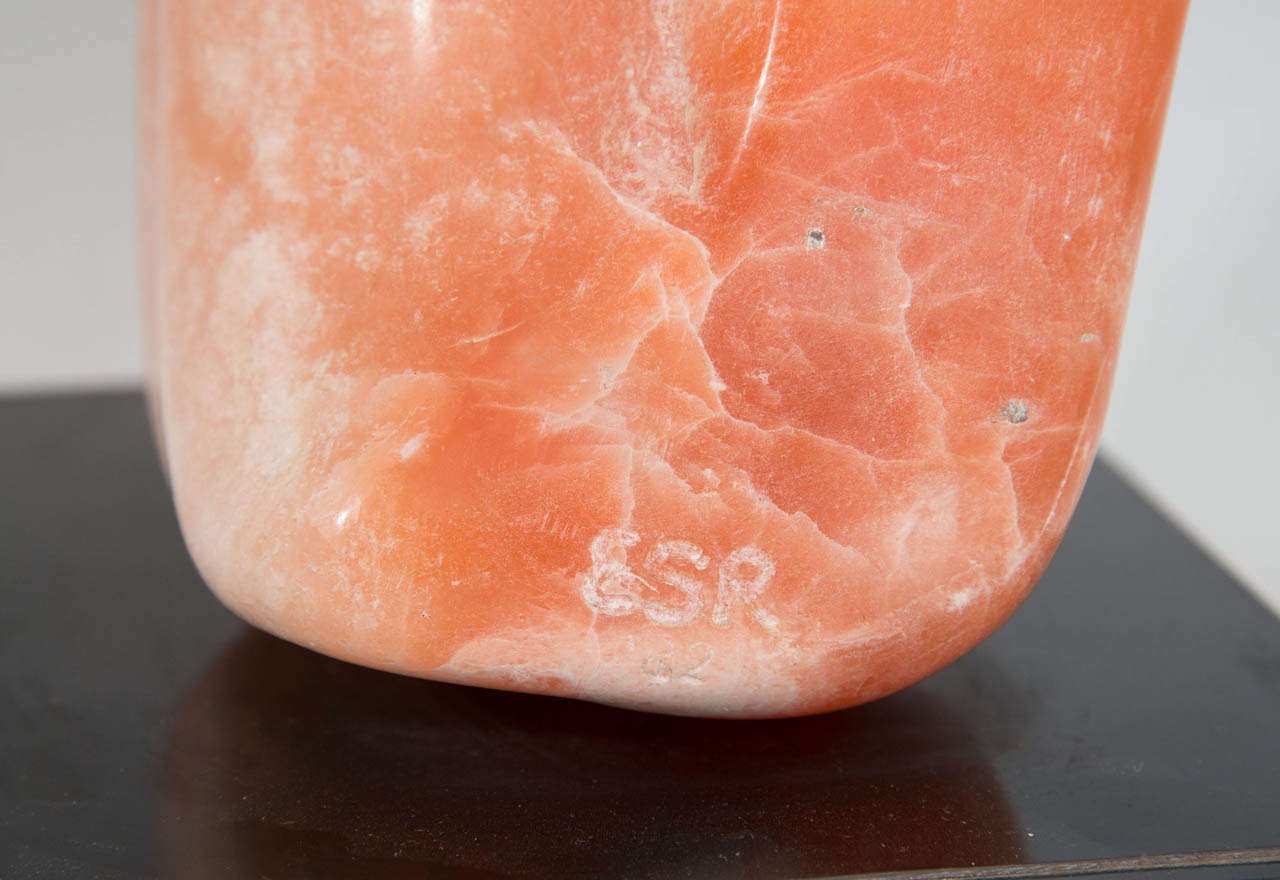 A Coral Colored Stone Sculpture with Revolving Base, Signed ESR In Good Condition In New York, NY