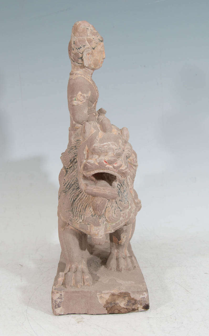18th Century and Earlier A Tang Dynasty Guanyin Riding on a Buddhist Lion