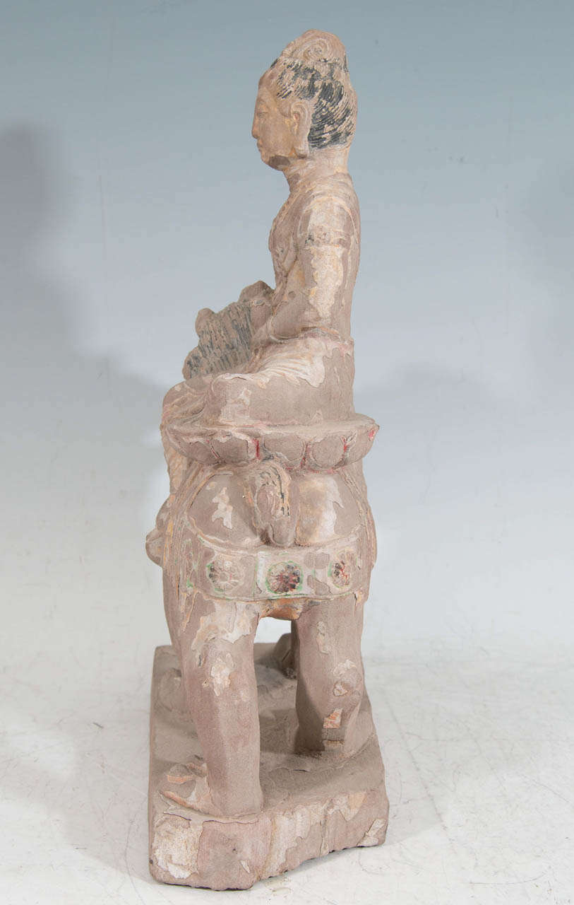 A Tang Dynasty Guanyin Riding on a Buddhist Lion 2