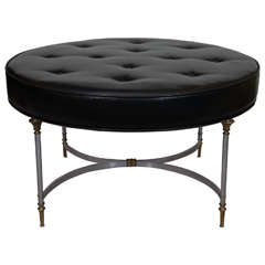 A Mid Century Maison Jansen Black Leather Circular Ottoman