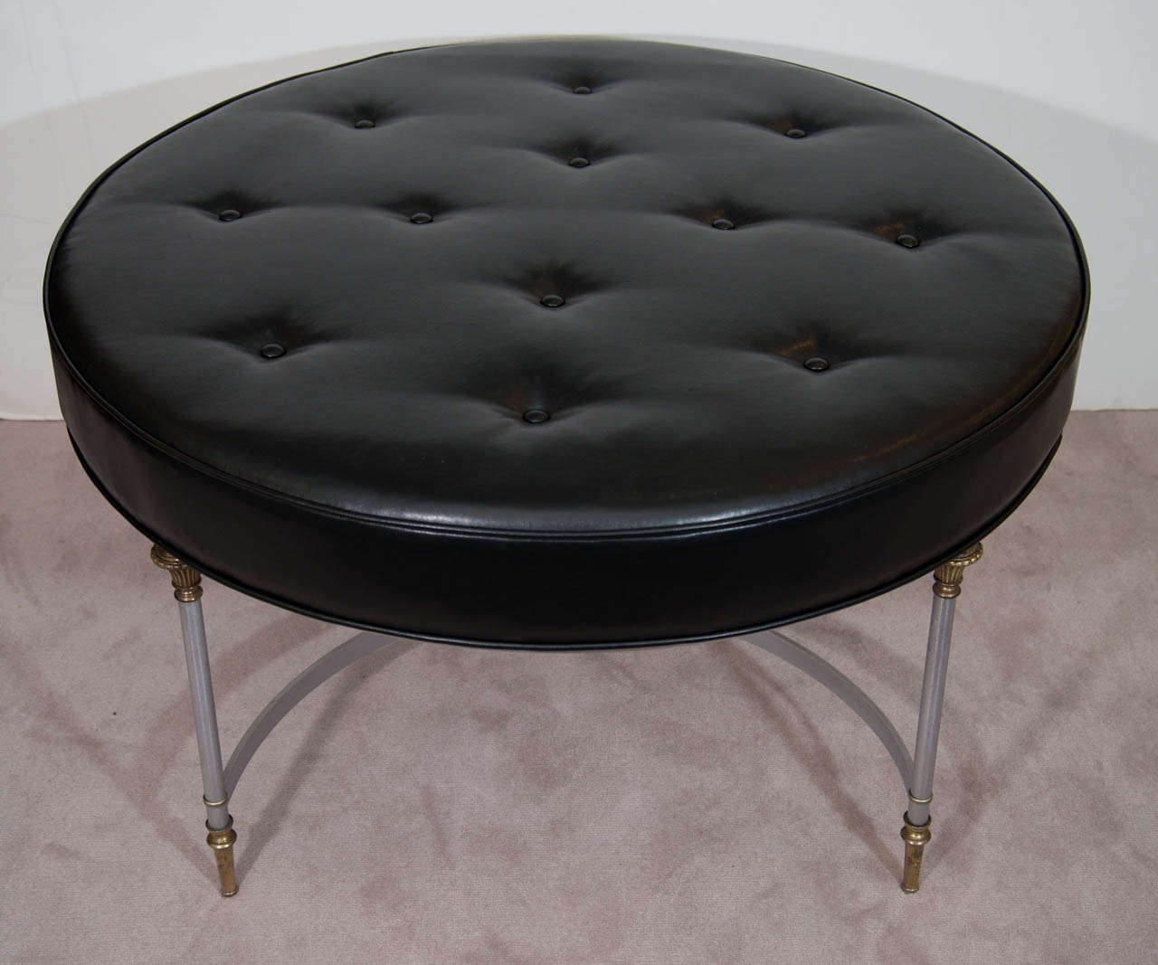 A Mid Century Maison Jansen Black Leather Circular Ottoman In Good Condition In New York, NY