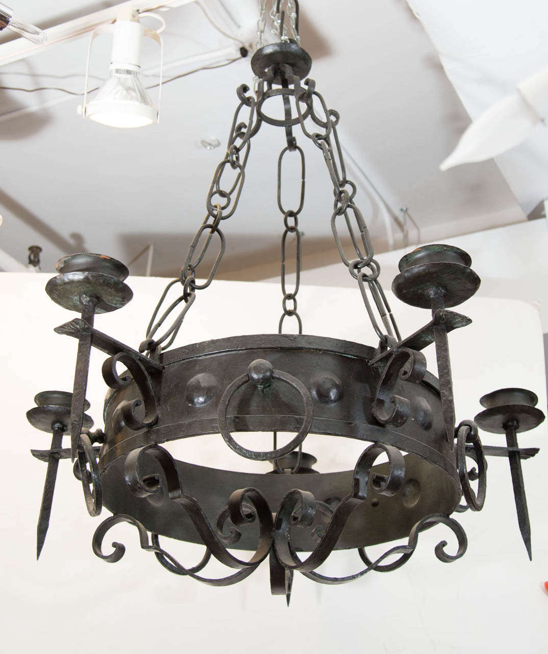 A 19th century five-light hand forged iron candelabra. Good condition with age appropriate wear.
