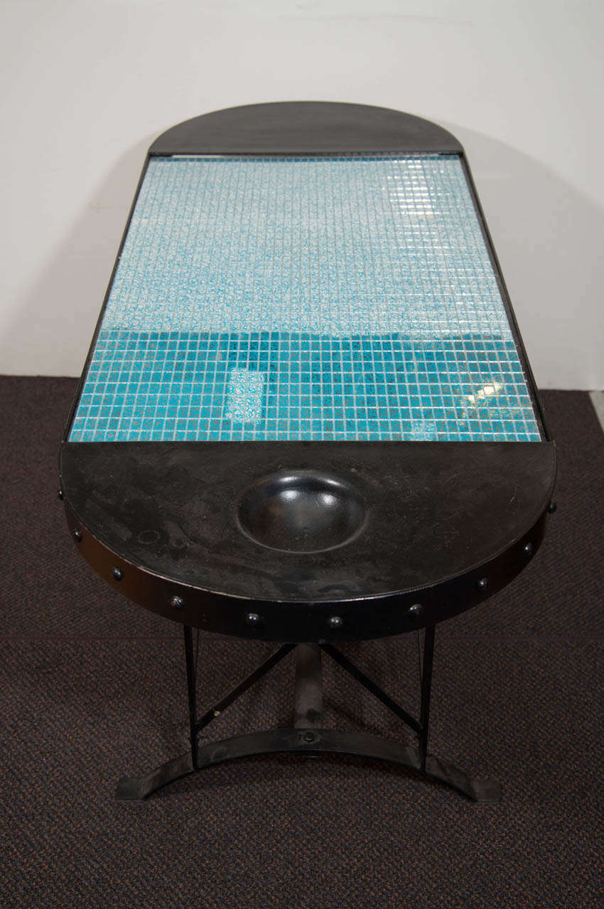 A Mid Century Iron Table with Blue Glass Top 1