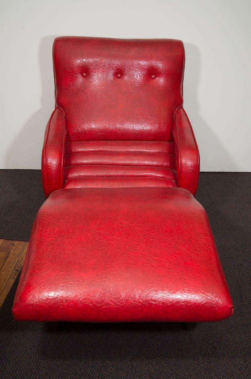 A vintage contour arm chair made of red Naugahyde that vibrates. Adjusts easily up and down.

Good vintage condition with age appropriate wear.  Vibration is no longer strong.

Reduced from: $1,875