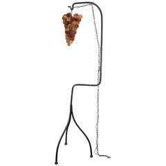 A Mid Century Grape Cluster Light with Iron Stand