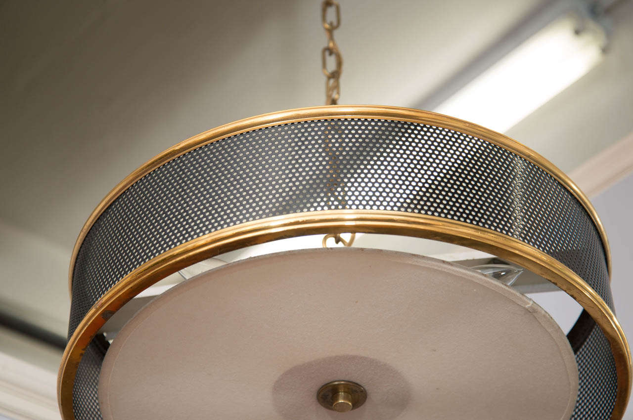 French A Mid Century Perforated Light Fixture in the Style of Guariche