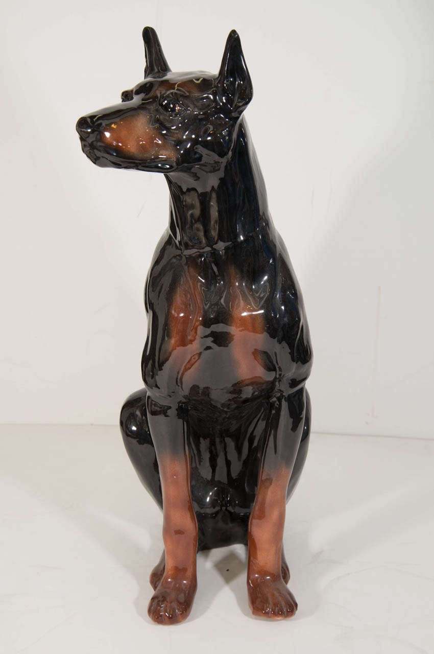 A vintage glaze pottery life size dog statue of a Doberman Pincher.

Good vintage condition with age appropriate wear.

Reduced from: $875