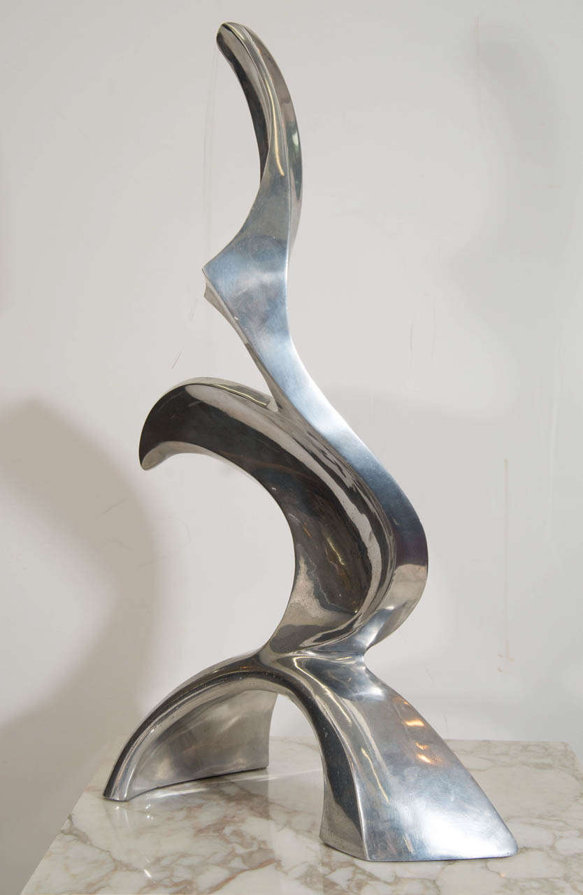 A vintage aluminum abstract sculpture signed Chris Petersen

Good vintage condition with age appropriate wear.