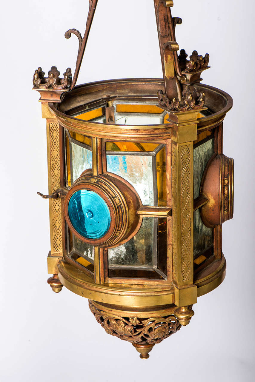An Arts & Crafts Brass and stained glass Lantern.
England circa 1900