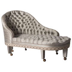 A silk upholstered, buttoned Chaise Longue