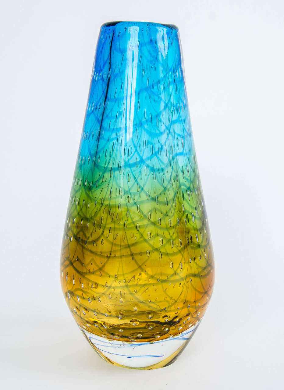 Venini multicolor bubble vase (labeled), prod. Italy, Murano, 1960.
Height 29.00 cm.11.42 in.
Top diameter 6.50 cm. 2.56 in.
Base diameter 7.00 cm. 2.75 in.
Free shipping to London.