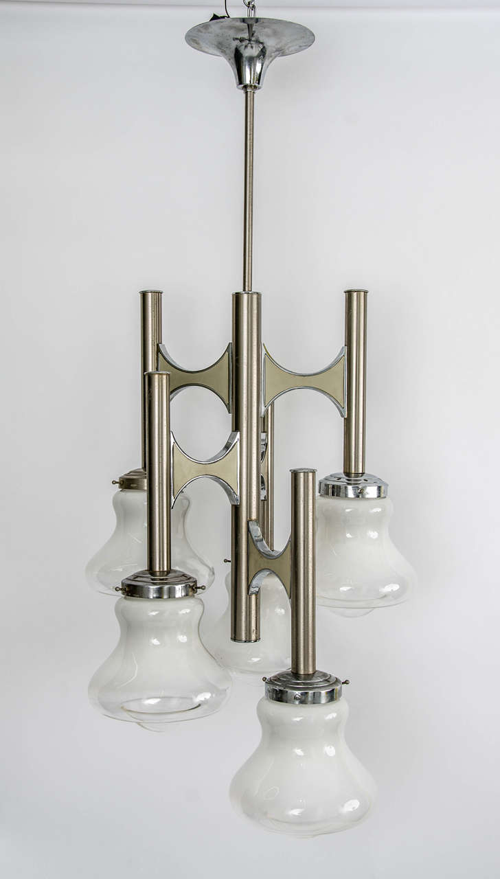 Chandelier five lights made by Sciolari, prod. Italy, circa 1970.
Total height from ceiling 105 cm. 41.35 in.
Max width 46 cm. 18.11 in.
Free shipping to London.