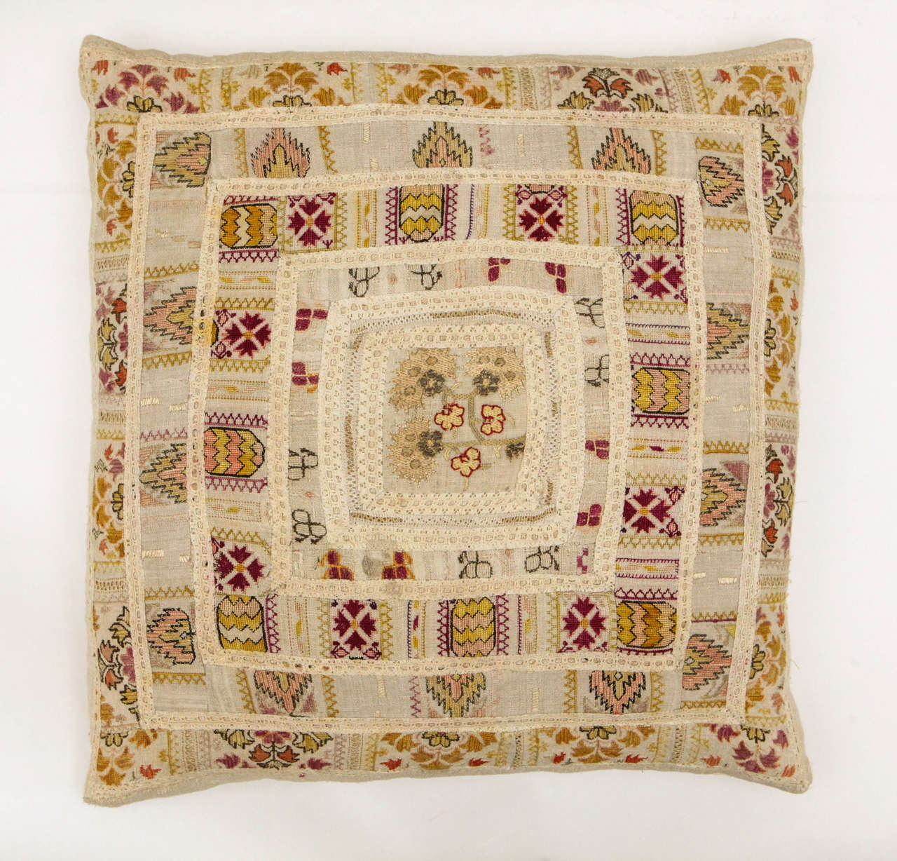Greek patchwork textile (silk on linen embroidery and lace)  mounted on and backed with vintage European hand woven line.  Magenta, gold, pink, orange, red and ivory.  Feather and down fill.