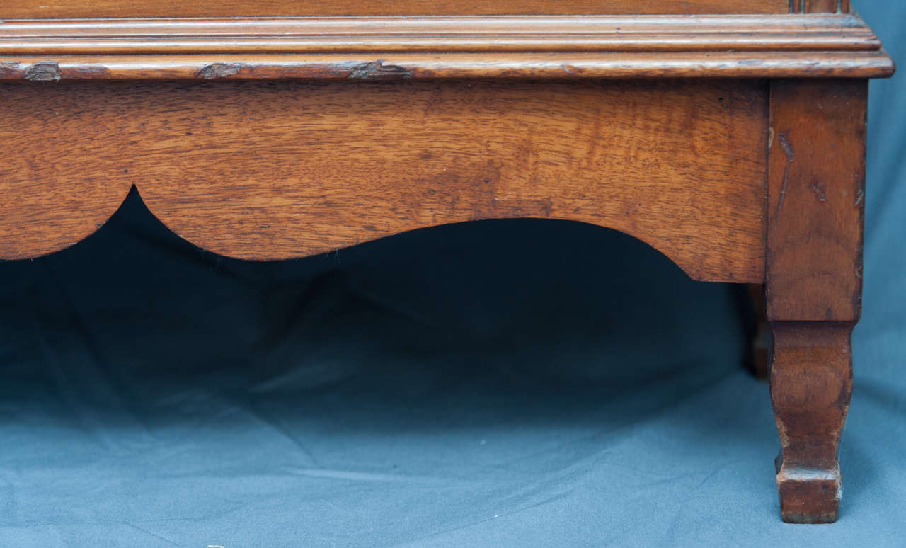 A fine Walnut Bookcase by Morris & Co, designed by George Jack. 1