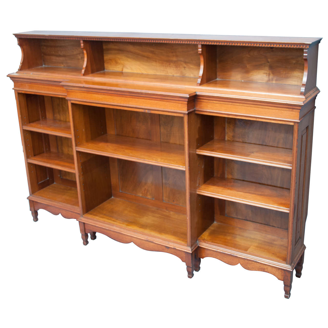 A fine Walnut Bookcase by Morris & Co, designed by George Jack.
