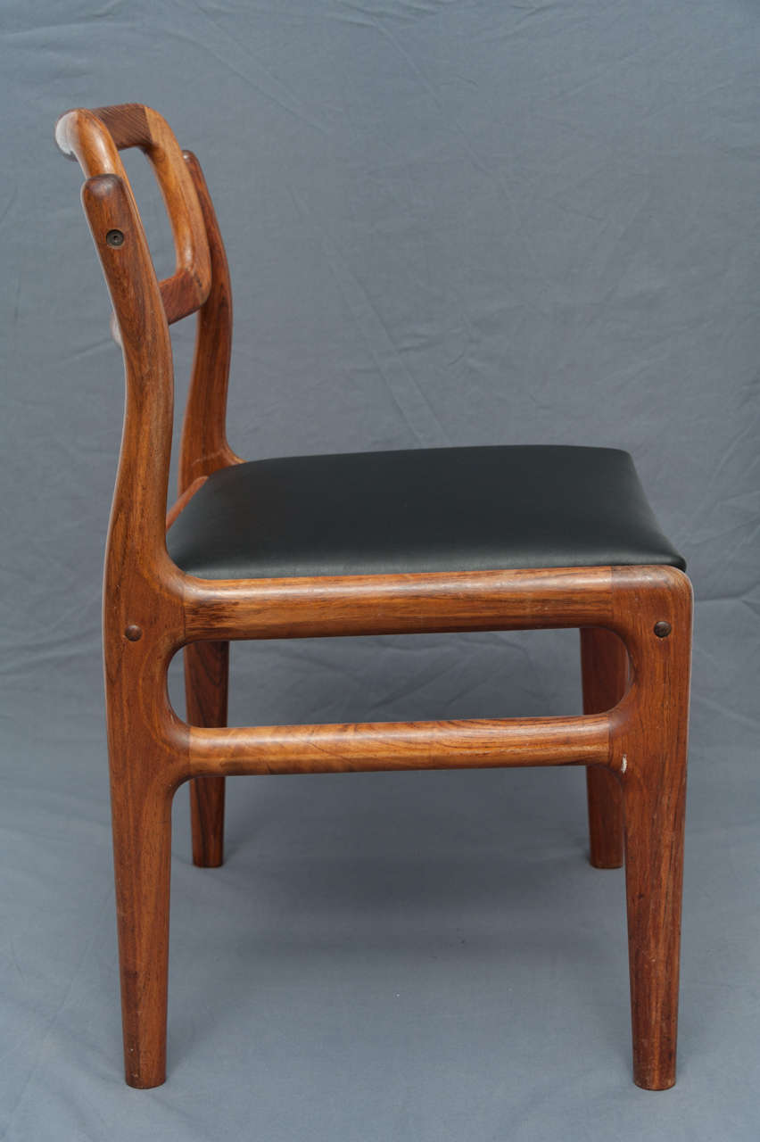 Udlum Mobelfabrik set of four Indian rosewood chairs, Denmark circa 1960 1