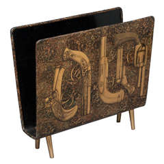 An early Piero Fornasetti Magazine rack.