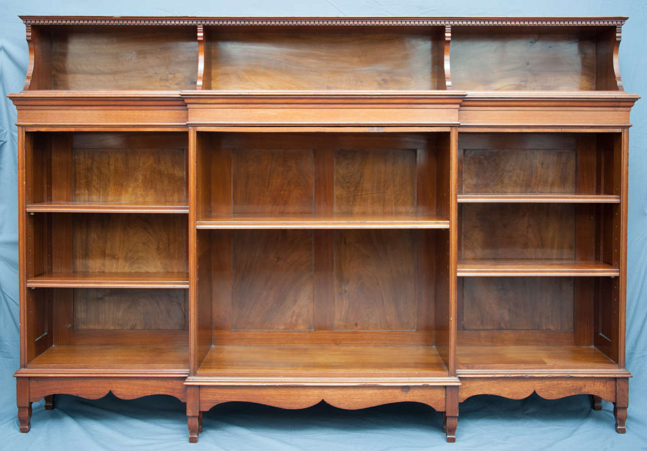 A fine Walnut Bookcase by Morris and Co, designed by Jack. at