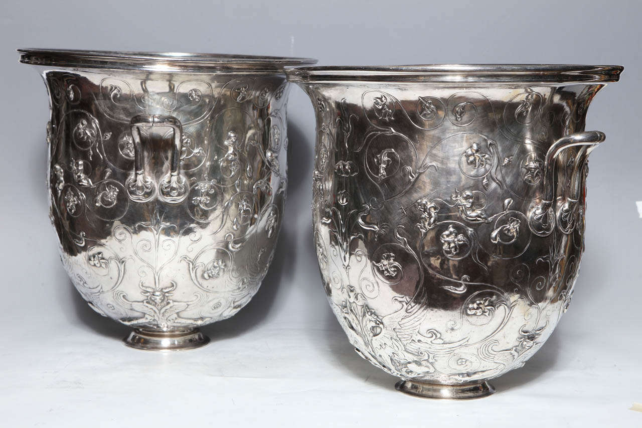 A extremely rare and quite large pair of Antique French Neoclassical Silvered Bronze Champagne Buckets by Christofle. Founded in 1830 Christofle became one of Europe's most important silversmiths when it acquired English silver plating patents in