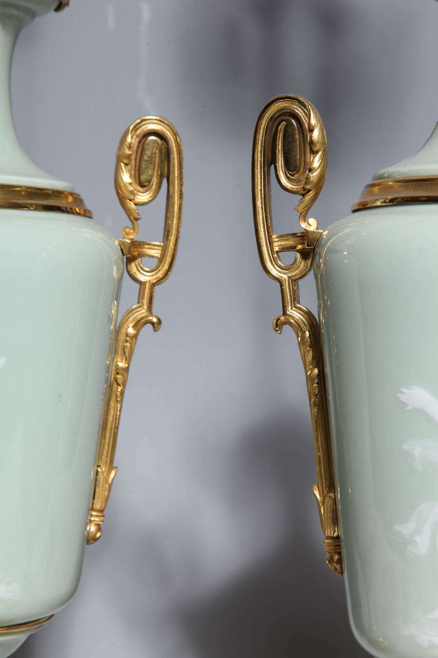 19th Century Pair Ormolu Mounted 'Pate sur Pate' Porcelain Lamps Depicting Cupids For Sale