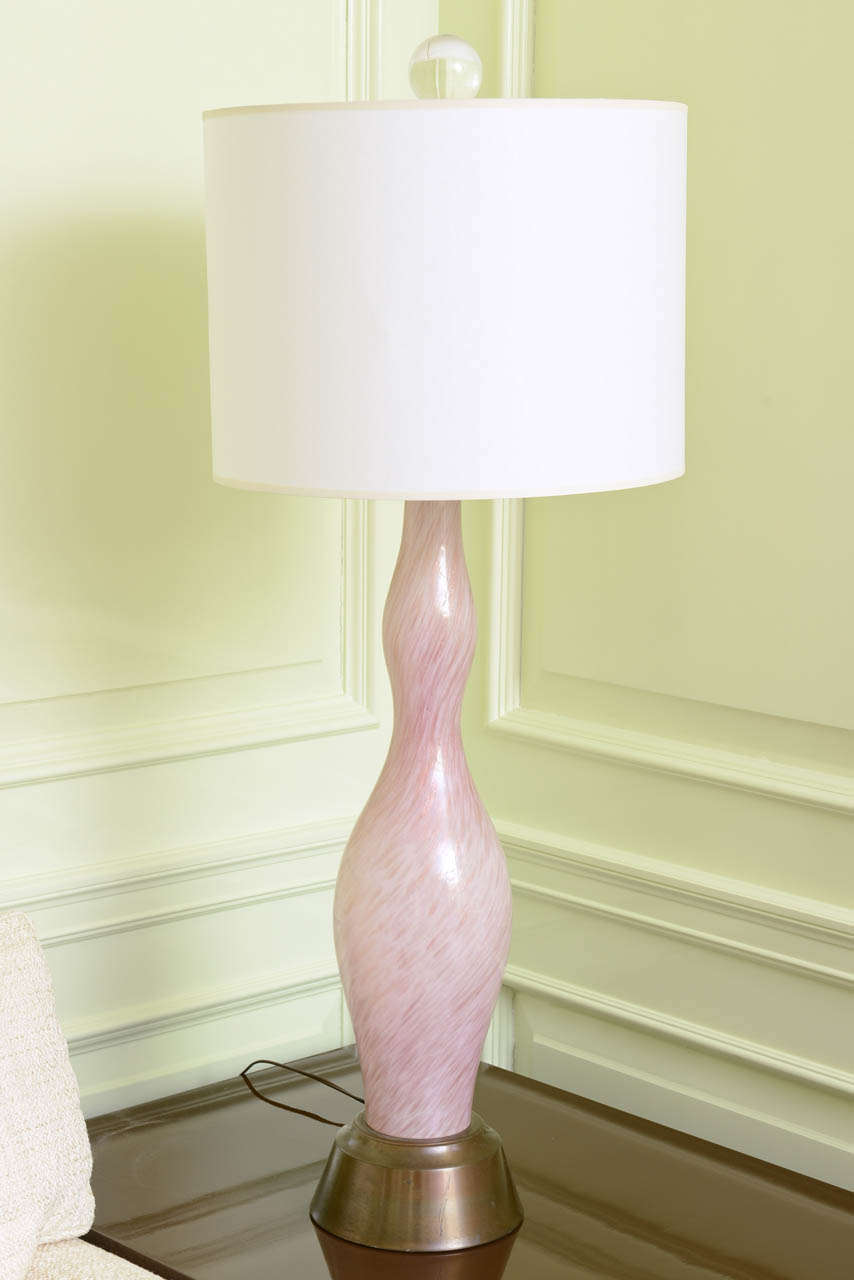 Lamp is a pretty orchid pink with gold luster. Each lamp base measures 27