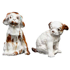 A Pair of 20th Century Glazed Terra Cotta Dog Sculptures