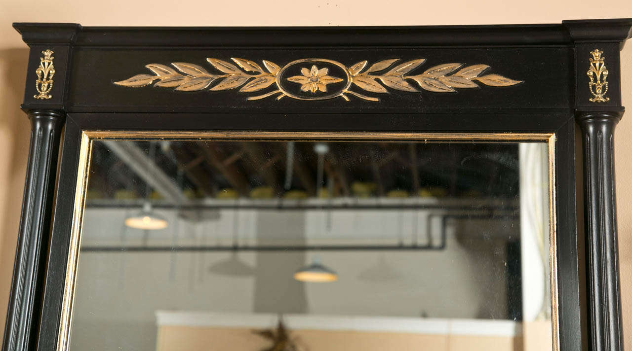 American Pair of Ebonized and Gilt Decorated Wall Mirrors