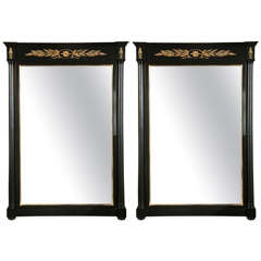 Pair of Ebonized and Gilt Decorated Wall Mirrors