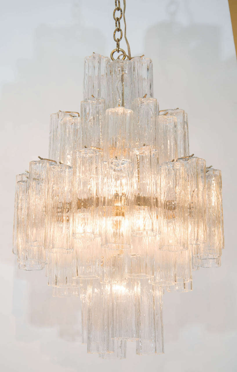 Grand and showy multi-tiered tronchi crystal chandelier. Please contact for location.