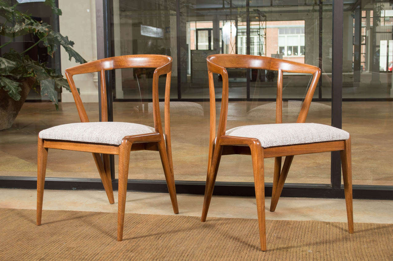 A pair of side chairs by Bertha Schaefer in walnut with upholstered seats. Beautifully crafted. 
Bertha Schaefer for Singer and Sons.