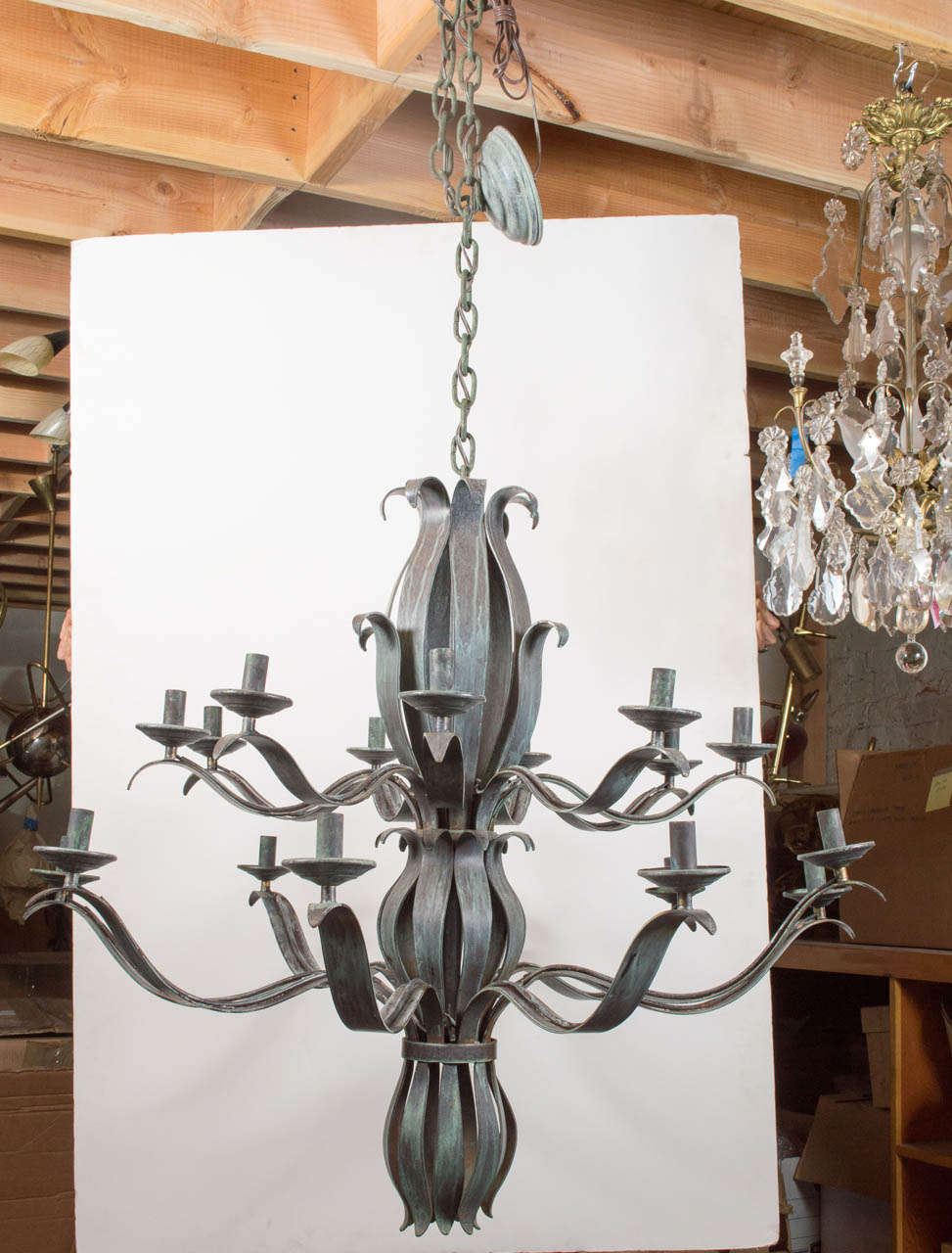 Vintage metal chandelier with gathered foliate forms.  18 lights newly rewired, UL listing available for an additional fee.  3ft of chain and canopy included.