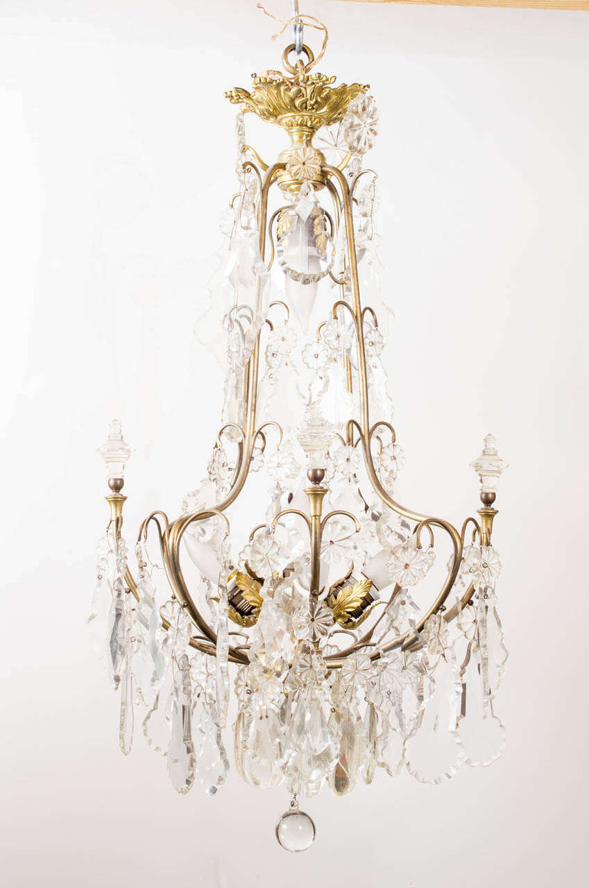 American 1920s Victorian brass and crystal chandelier.  Newly rewired, UL listing available for an additional fee.