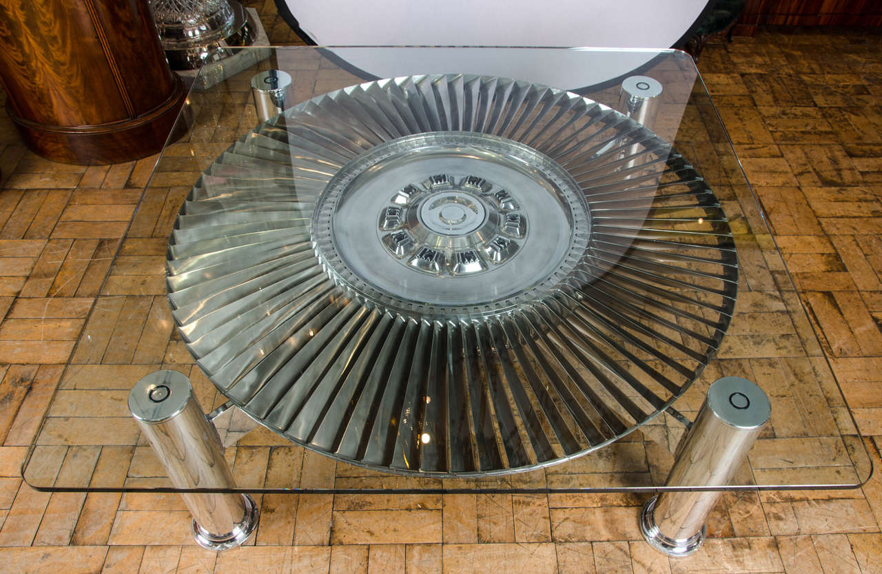 A high pressure turbine from a Concorde engine (Rolls-Royce, Snecma Olympus 593) mounted as a low table.

The olympus 593 jet engine was produced by Rolls Royce and Snecma to power the supersonic airliner Concorde. Only 67 were built.

The