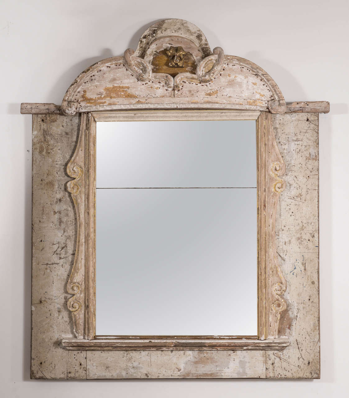 Decorative painted mirror from 18th century altar elements.