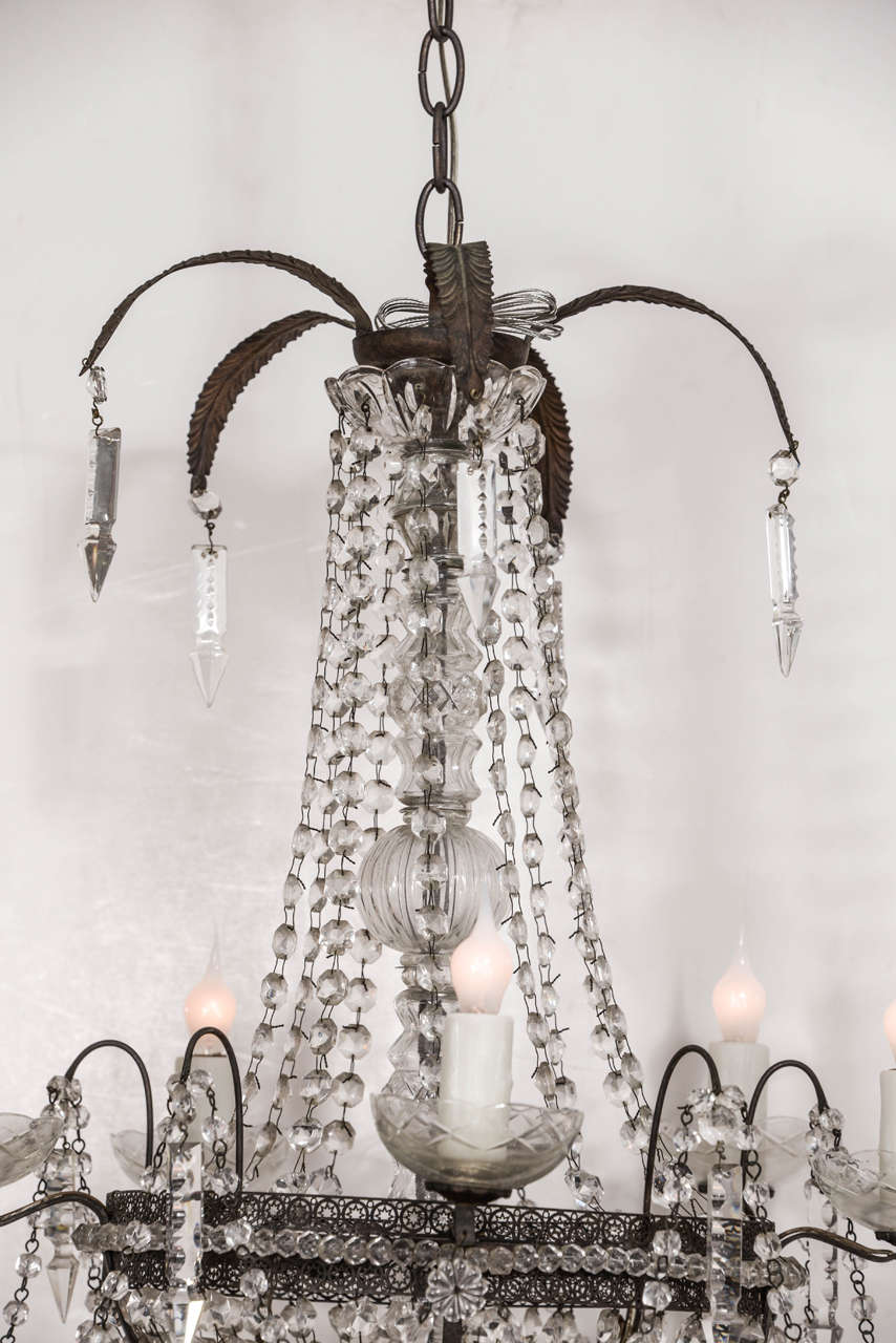 Pierced Tole Italian Chandelier Decorated in Crystal and Glass Prisms
