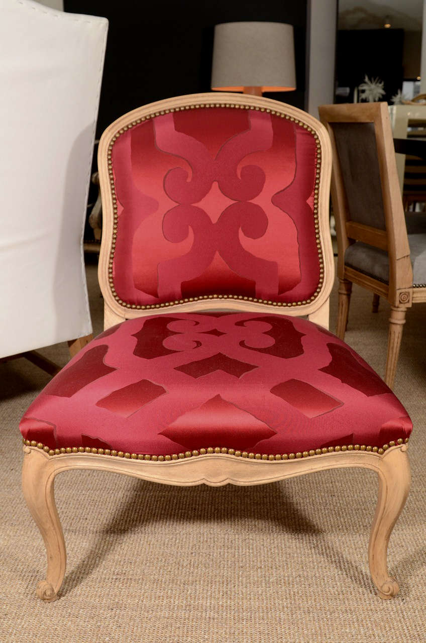 Slipper chairs upholstered in Red silk Dedar fabric 