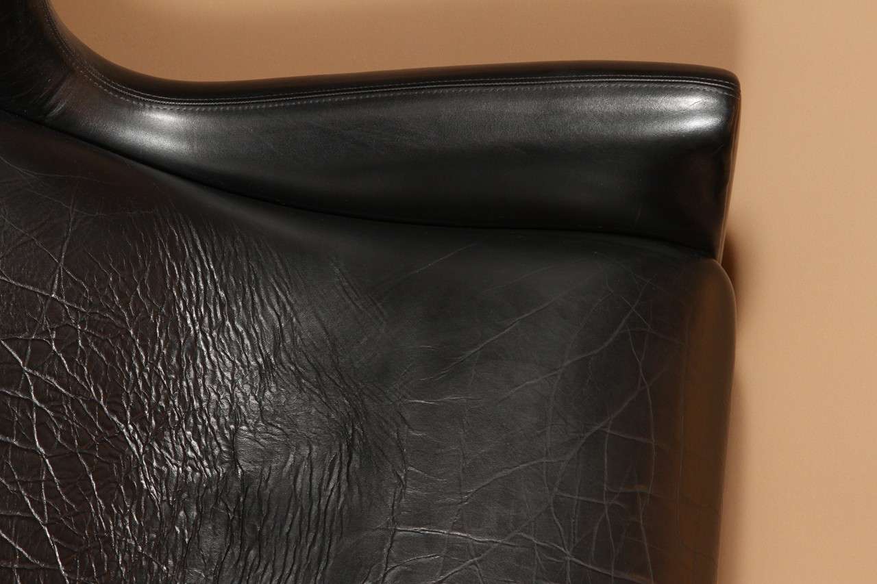 Illum Wikkelsø model 110 Black Leather Chair with Ottoman 3