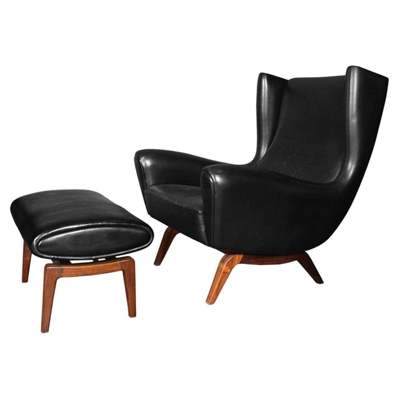 Illum Wikkelsø model 110 Black Leather Chair with Ottoman