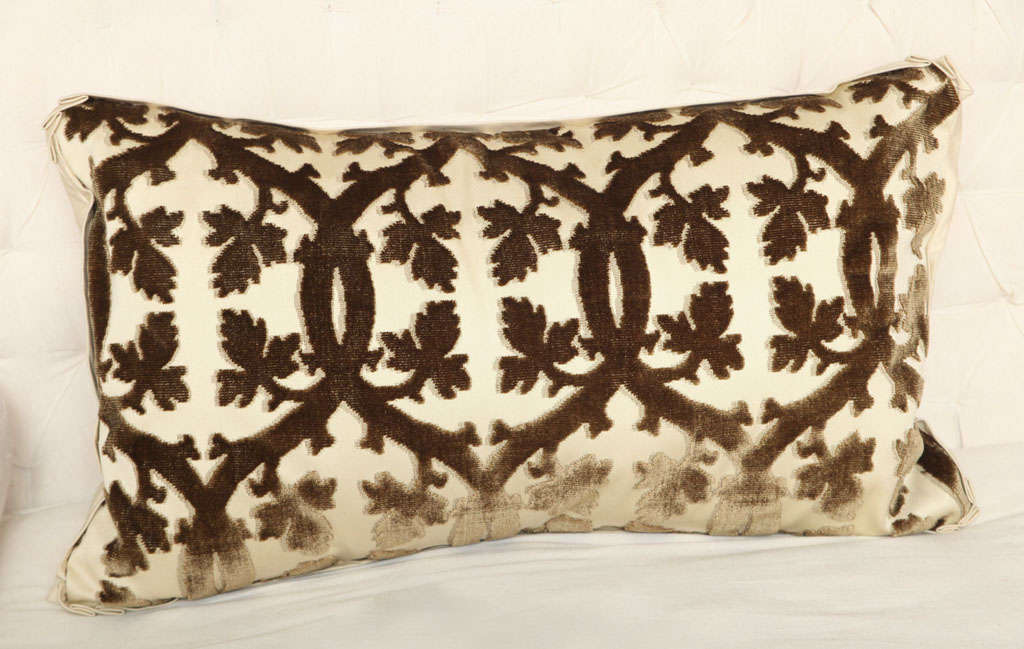 Elegant lumbar pillow with a silky feel and a magnificent sheen. Beautiful brown color that slightly changes hue depending upon the light.  Raised cut velvet on the ivory background. Linen back.  New down pillow insert.