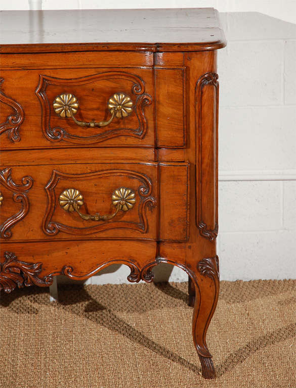Walnut Sauteuse Commode