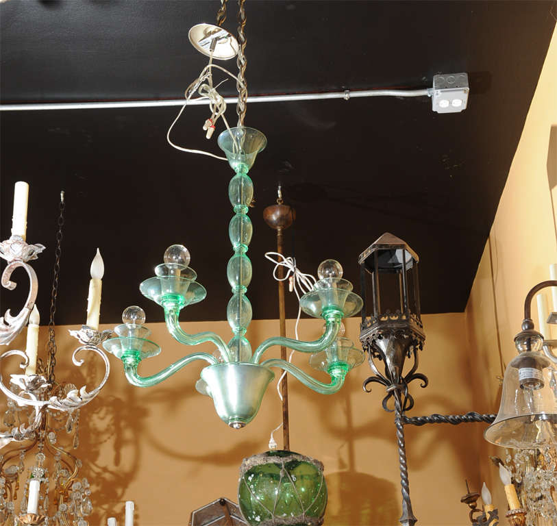 Lovely green murano glass chandelier.  Clean, modern lines.  Newly wired.  UL listing available for an additional fee.