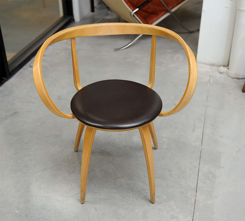 Pair of laminated birch and leather Pretzel chairs (no. 5890), for Herman Miller, Unmarked.