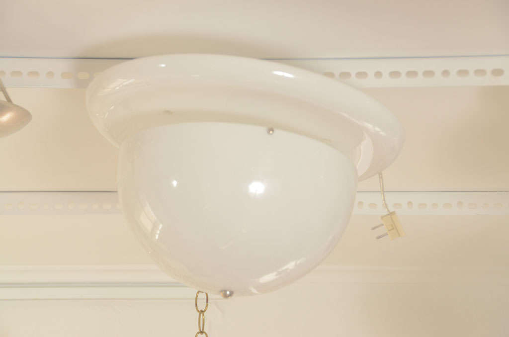 Plexiglass domed ceiling flush mounted fixture.