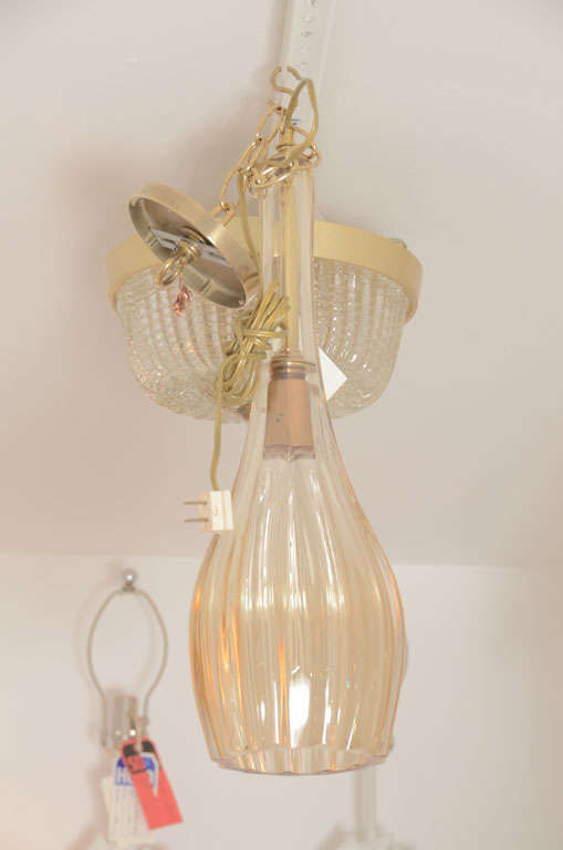 Fluted Murano Glass Pendant in a champagne color
