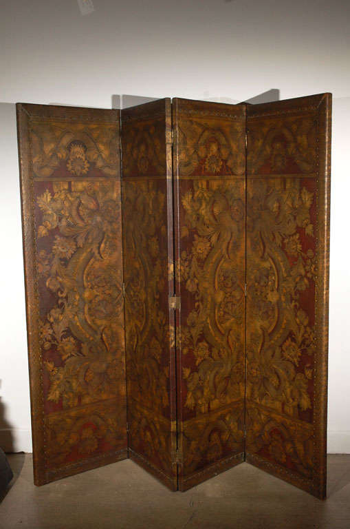 Gorgeous Spanish Baroque Leather Embossed 4 floor fold panels Screen.
A gorgeous 19th Century leather Spanish embossed screen with floral decorations.Spanish baroque style embossed and painted polycrom leather four-fold floor screen finish with