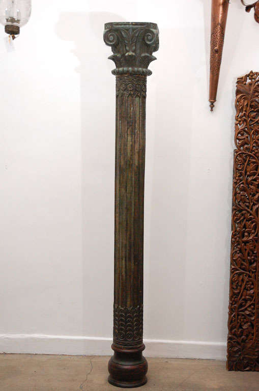 Handcrafted Anglo Indian architectural wooden pair of carved columns.
The base and crown are removable from the pillar.
Base is 13