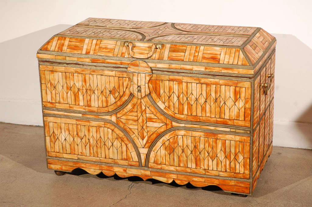 Spectacular large handcrafted Hispano Moresque style dowry coffer heavily inlaid with camel bone and brass.
Moroccan Moorish wedding dowry floor chest finely detailed and hand-carved all-over with brass and camel bone inlaid, brass handles and